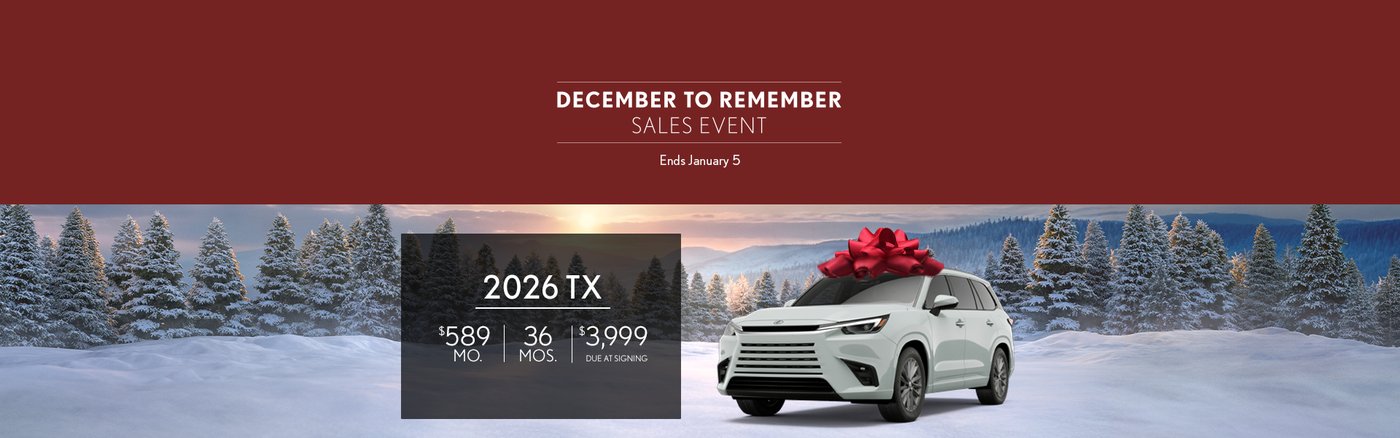 'December to Remember Sales Event' banner for the 2026 Lexus TX, showing a white TX with a red bow in a snowy scene.
